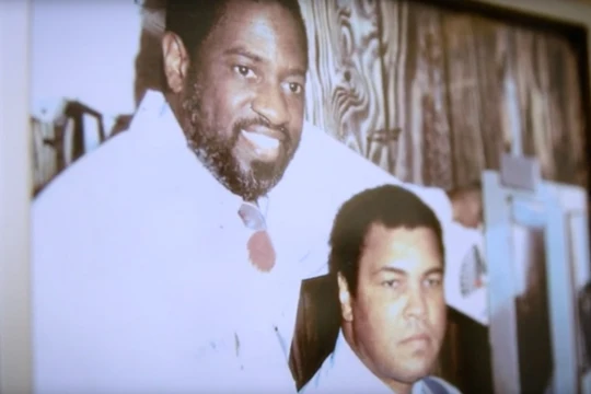 Dr. Edward D. Williams is pictured with former patient, Muhamad Ali